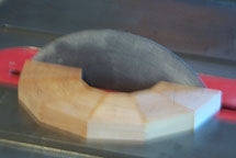Using a flat disk sander to true up a segmented ring